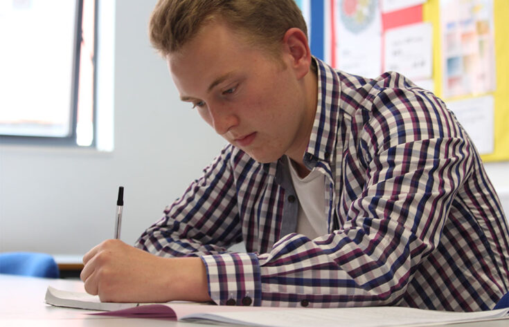 Photograph of an Economics student studying
