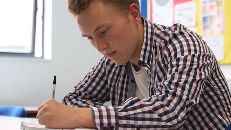 Photograph of an Economics student studying