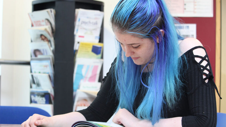 Photograph of a Psychology student studying