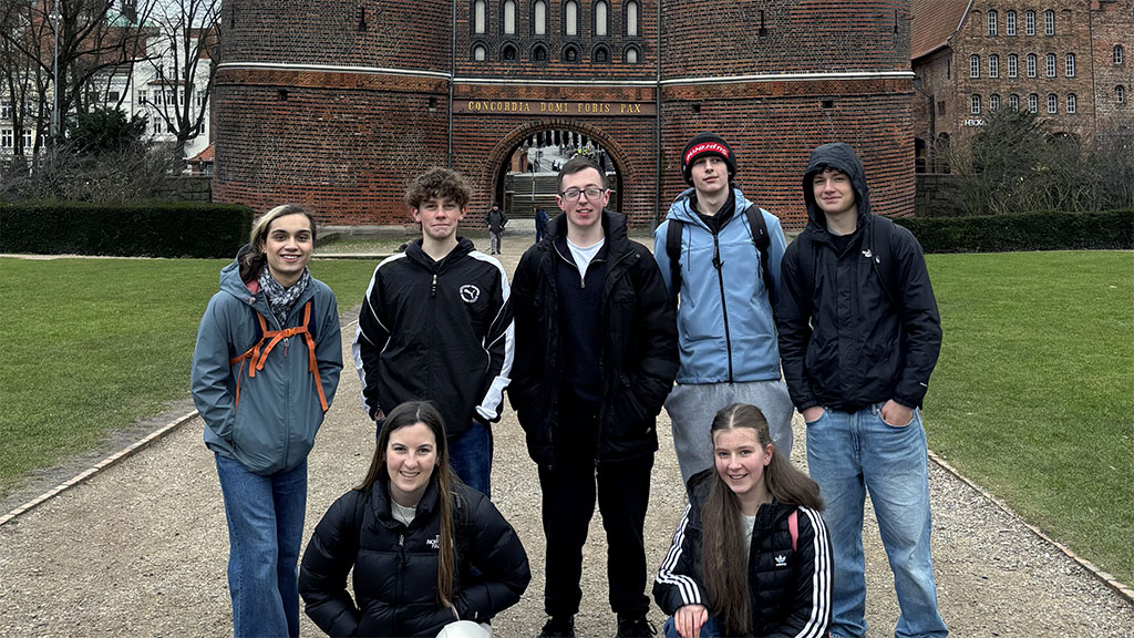 Photograph of German students outside the Holstentor (city gate) in Luebeck