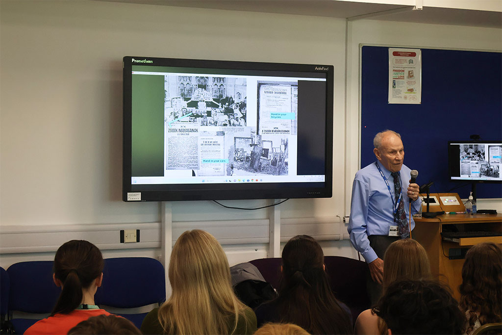 Guest speaker Tomi Komoly talks about his experience of the Holocaust.