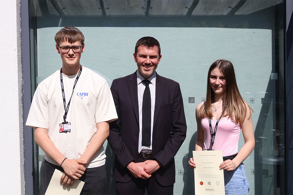 Photograph of students receiving their awards