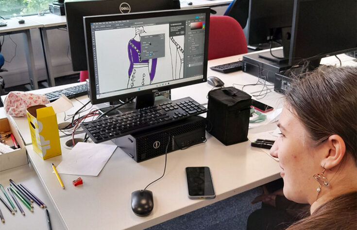 Student working on a fashion project